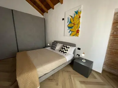 Letto o letti in una camera di Luxuria