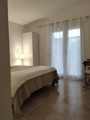 Letto o letti in una camera di Villa Sofia