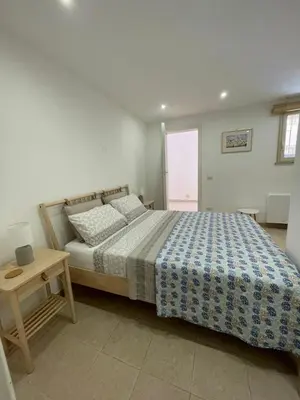 Letto o letti in una camera di Oasi Sul Golfo