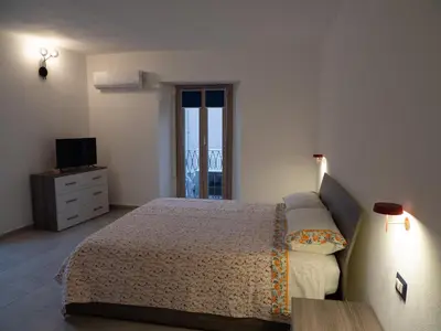 Letto o letti in una camera di Villa Ecclesiae