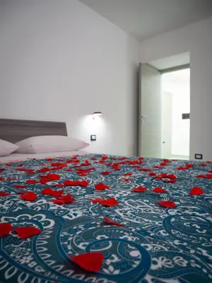 Letto o letti in una camera di Villa Ecclesiae