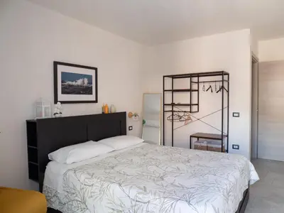 Letto o letti in una camera di Villa Ecclesiae