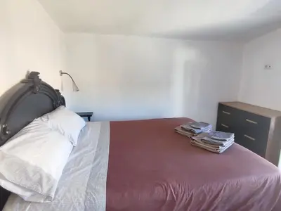 Letto o letti in una camera di La manSarda