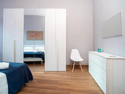 Letto o letti in una camera di Maestrale Apartment