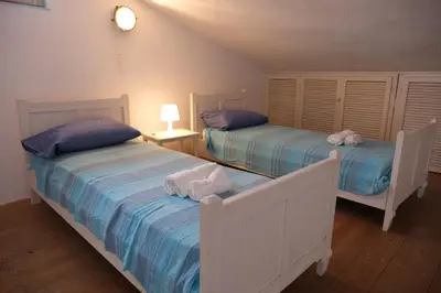 Letto o letti in una camera di Casa Bianchi - Villa immersa nel verde