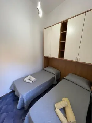 Letto o letti in una camera di Casa Gabry e Lory