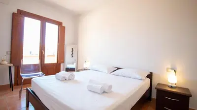 Letto o letti in una camera di Su Pasiu-Charming house in Sinis