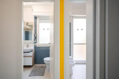 Bagno di Kalbia Rooms managed by HolyDaisy - Renovated, functional, intimate and more