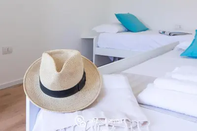 Letto o letti in una camera di Villa Dubois