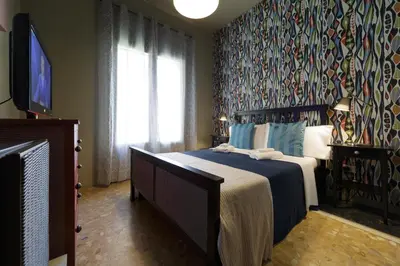 Letto o letti in una camera di GUEST HOUSE SONNINO 37 Cagliari