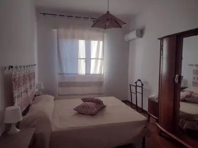 Letto o letti in una camera di Sa domu de Peppinu
