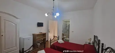 Letto o letti in una camera di Hotel Mondial 2