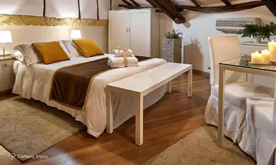 Letto o letti in una camera di Albergo Diffuso Birkin Castello