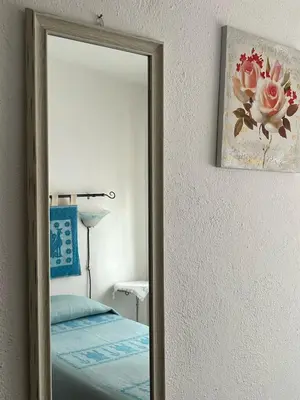 Letto o letti in una camera di Casa Rosa