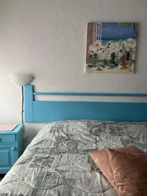 Letto o letti in una camera di Casa Rosa