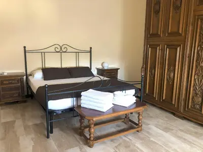 Letto o letti in una camera di Casa Piddiu