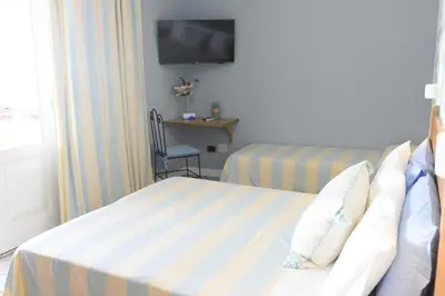 Letto o letti in una camera di Villa Elicriso