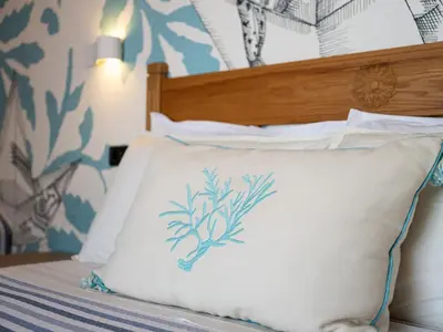 Letto o letti in una camera di Villa Elicriso