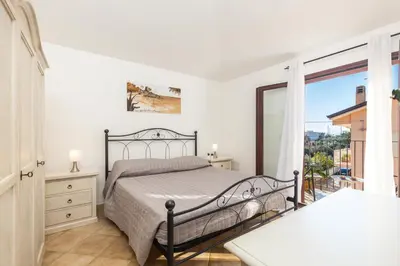 Letto o letti in una camera di ByNos Pool - Primo Piano