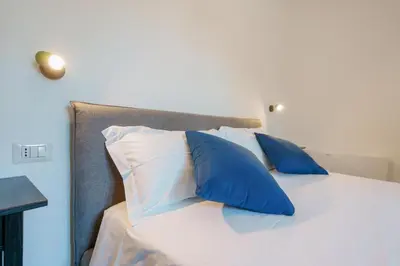 Letto o letti in una camera di Guest House Deidda - TS ROOMS B&B