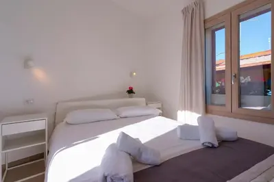 Letto o letti in una camera di Guest House Deidda - TS ROOMS B&B