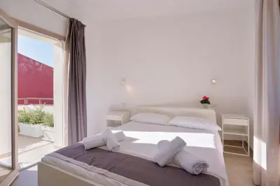 Letto o letti in una camera di Guest House Deidda - TS ROOMS B&B