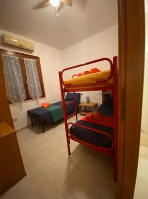 Letto o letti in una camera di Villa Livia