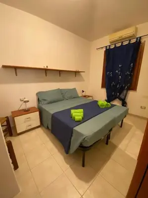Letto o letti in una camera di Villa Livia