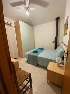 Letto o letti in una camera di Villa Livia