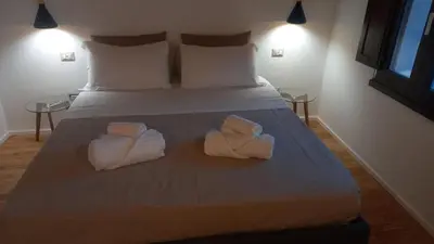 Letto o letti in una camera di La casetta Guest House Oristano