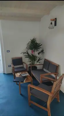 Area soggiorno di La casetta Guest House Oristano