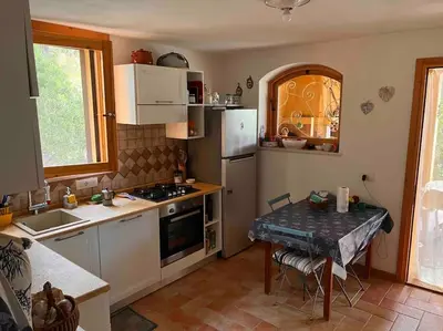 Cucina o angolo cottura di Cala Pira beach house
