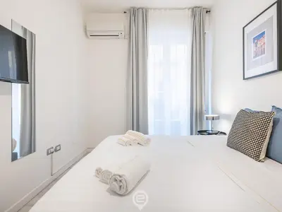 Letto o letti in una camera di Garibaldi Central Apartment