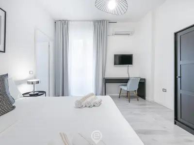 Letto o letti in una camera di Garibaldi Central Apartment