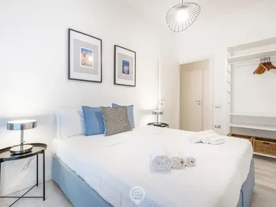 Letto o letti in una camera di Garibaldi Central Apartment