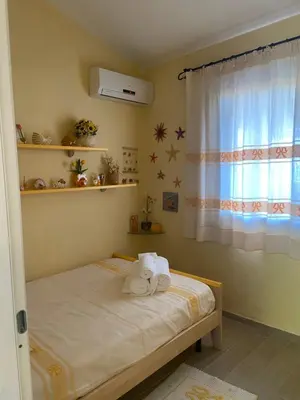 Letto o letti in una camera di Villetta belvedere
