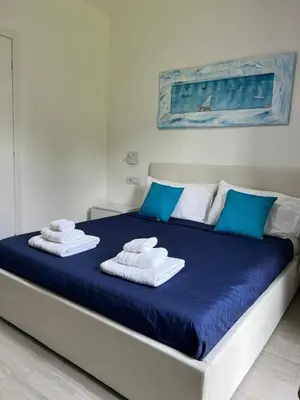 Letto o letti in una camera di Villa Aurice - Villasimius