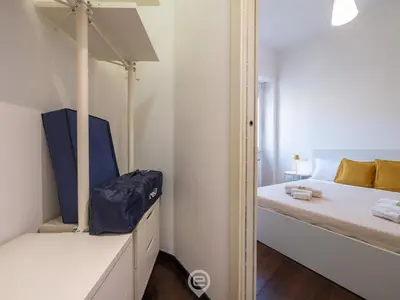 Letto o letti in una camera di Comfort Corner in Via Dante