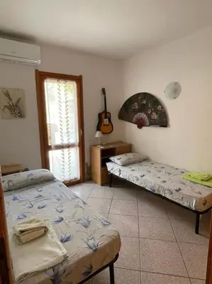 Letto o letti in una camera di CASA VACANZE MATTIA COSTA REI Iun Q6764