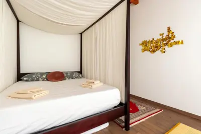 Letto o letti in una camera di Aphrodite`s Hideaway