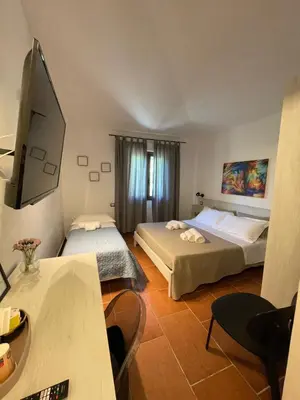 Letto o letti in una camera di Bent’E Mari