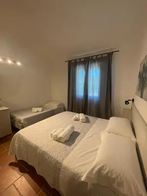 Letto o letti in una camera di Bent’E Mari
