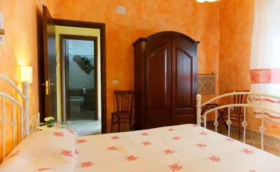 Letto o letti in una camera di Domu Severino camere
