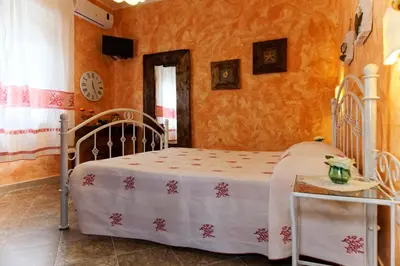 Letto o letti in una camera di Domu Severino camere
