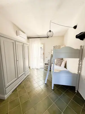 Letto o letti in una camera di Villa Margio