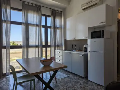 Cucina o angolo cottura di Monolocale Viale Arbatax