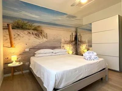 Letto o letti in una camera di Apt. MarisDomus, 300m dal Centro