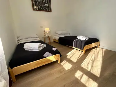 Letto o letti in una camera di Apt. MarisDomus, 300m dal Centro