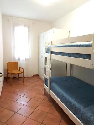 Letto o letti in una camera di Casa Gio' IUN R4246