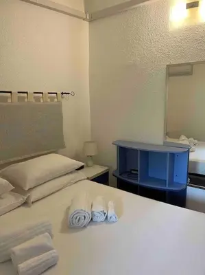 Letto o letti in una camera di Vacanze a pochi passi dal mare